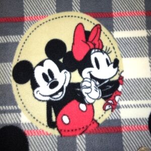 FABRIC Disney's Mickey & Minnie Mouse on plaid fleece licensed print
